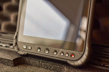 A close-up look at the lower front portion of a MINNO Android tablet. The power, volume, and back buttons are visible.